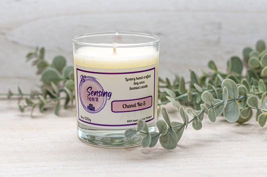 Chanel No5 soy wax candle in clear glass container with timeless elegant fragrance