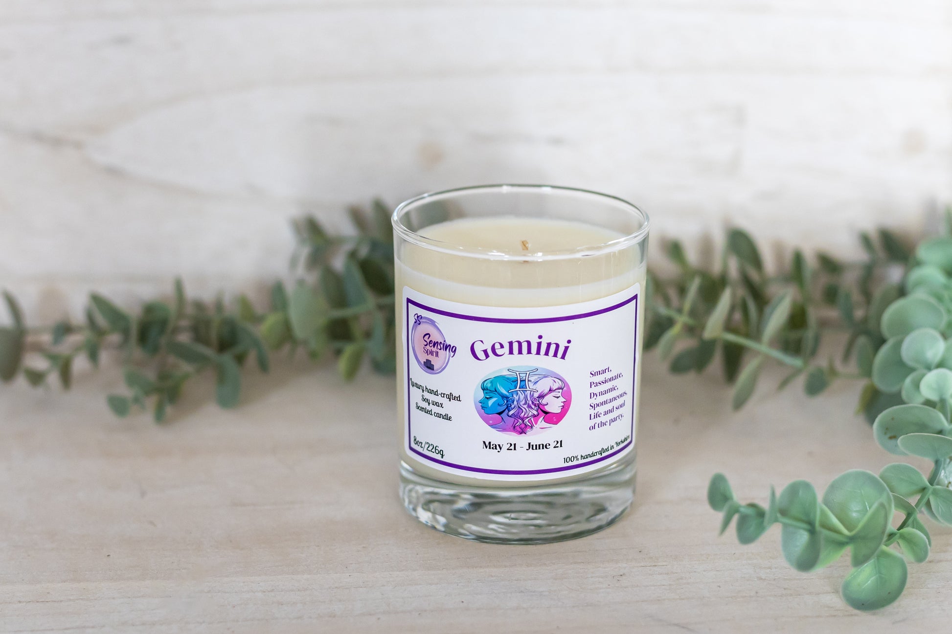 Gemini zodiac soy wax candle with Angel by Mugler fragrance in clear glass container