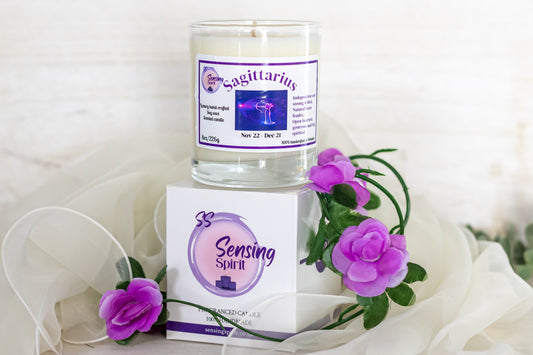 Sagittarius zodiac soy wax candle with Angel by Mugler fragrance in clear glass container with packaging box